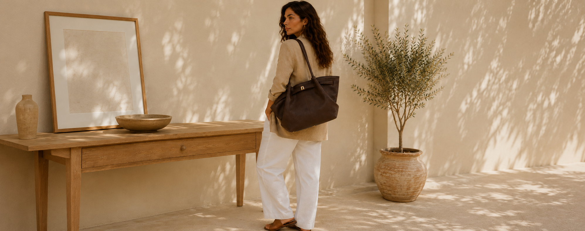 Woman with Luxe Bags Australia handbag in a sunlit interior